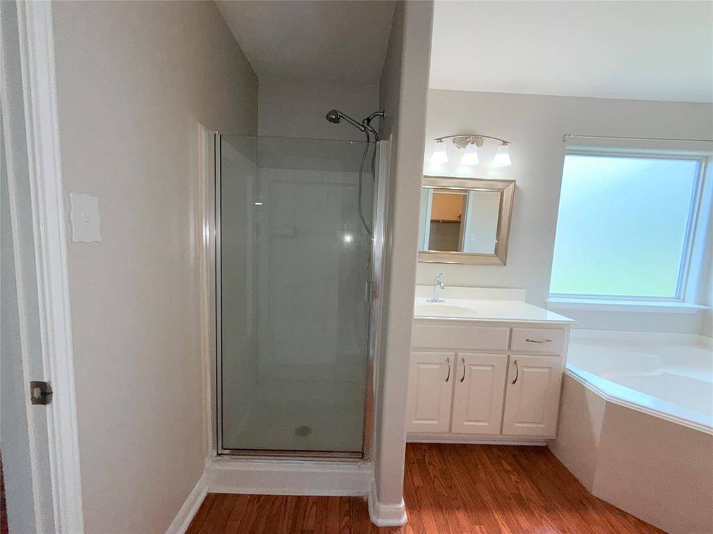 Primary Bathroom Separate tub and shower