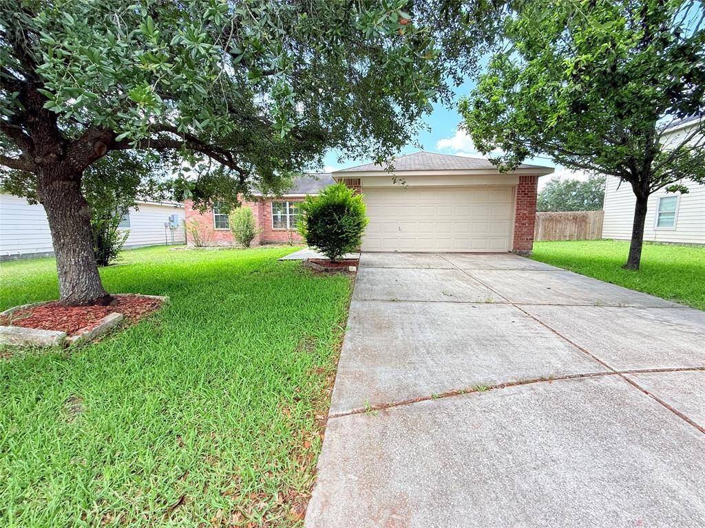 Double wide drive way with 2 car garage