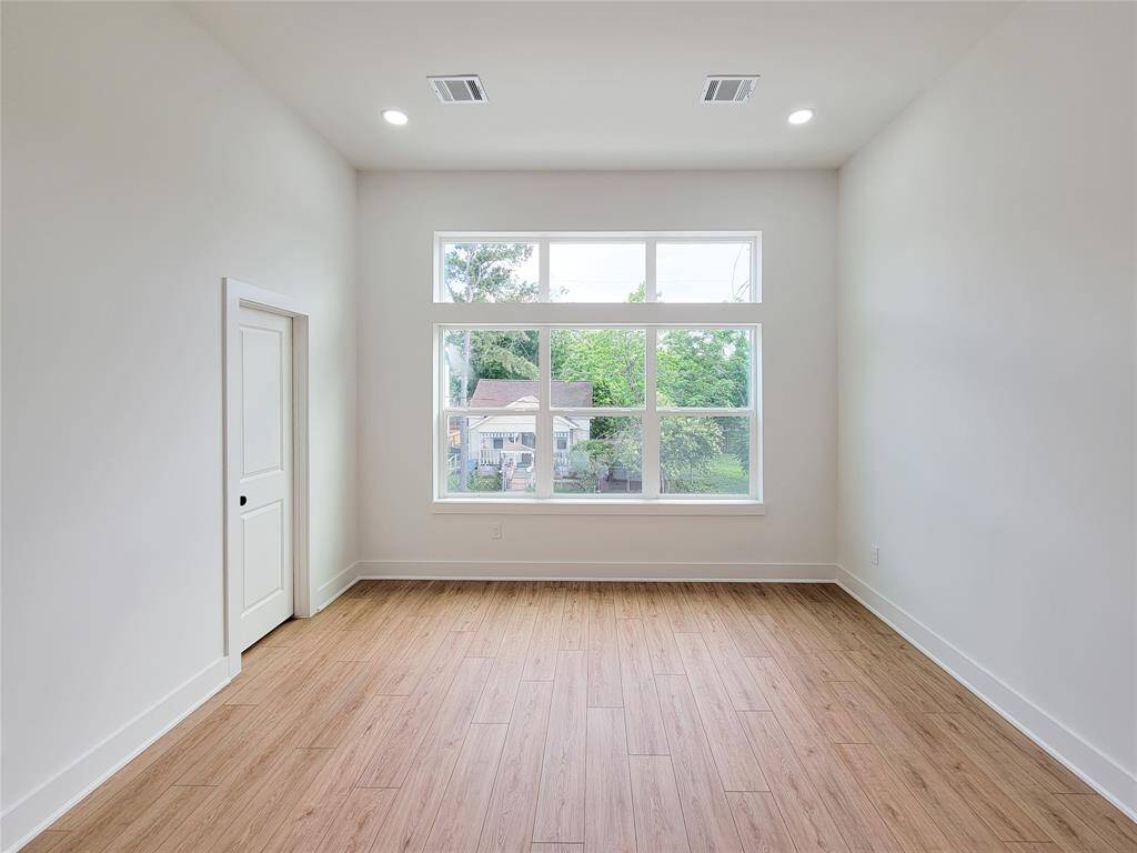 primary bedroom with downtown views