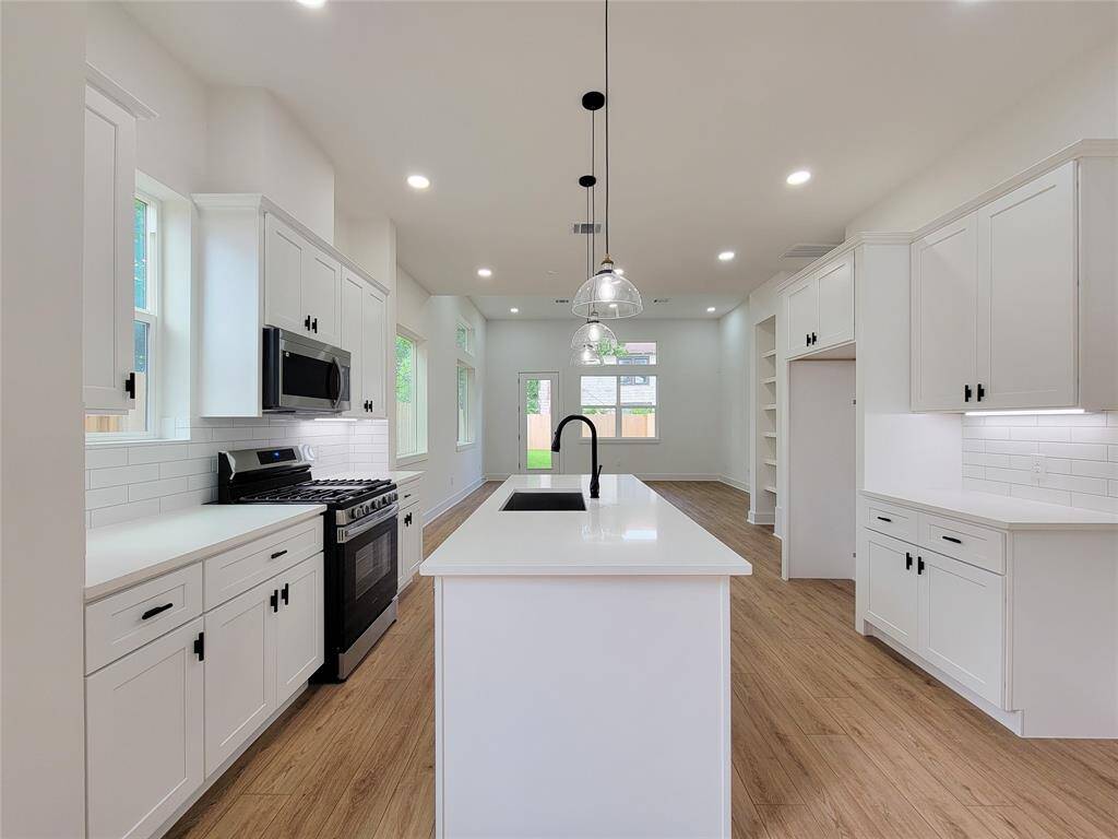 spacious kitchen open to living