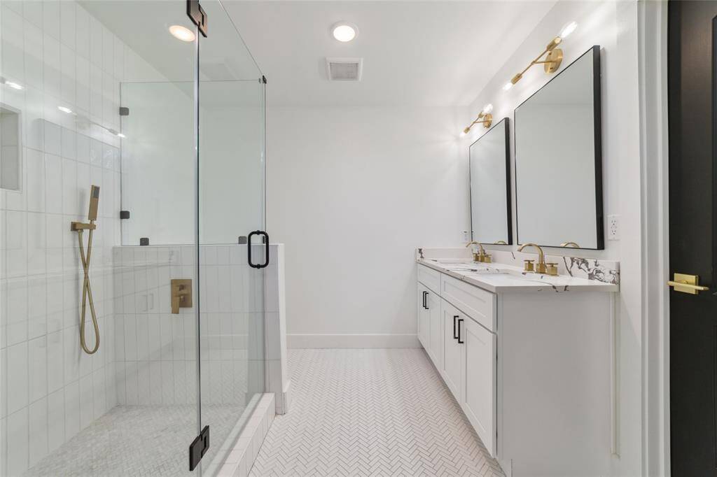 Spa like bathroom with sleek finishes.