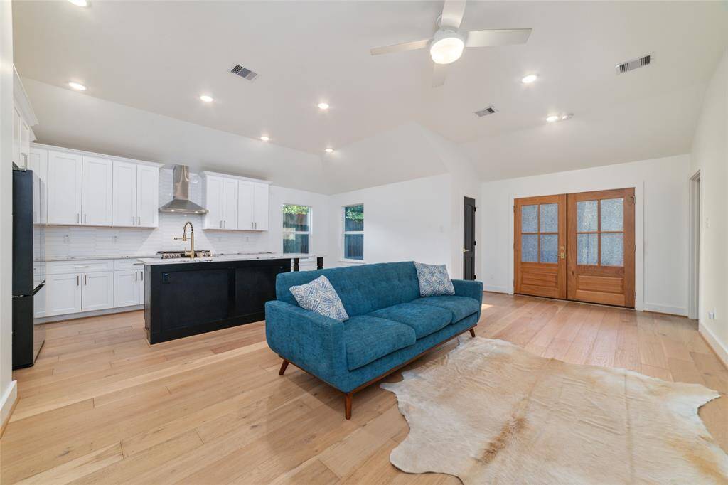 Now we walk into the grand space of the living room, and kitchen area