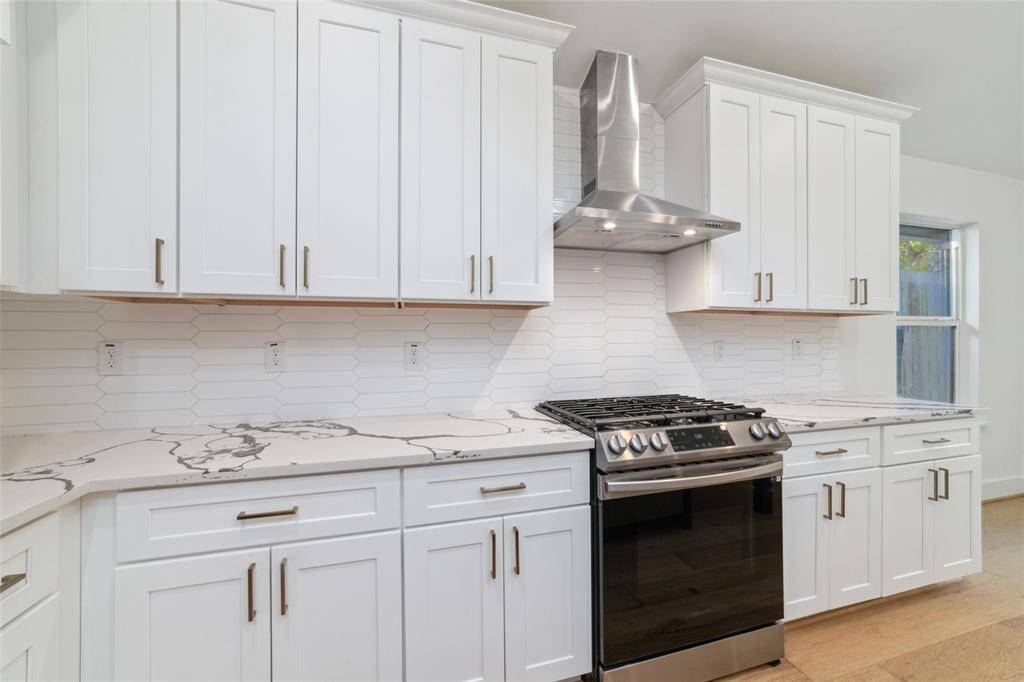 Custom soft close cabinetry, and high end appliances