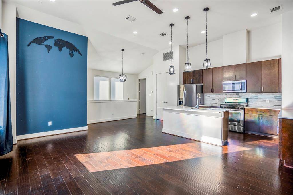 Seamless open living and kitchen layout—modern, bright, and airy.
