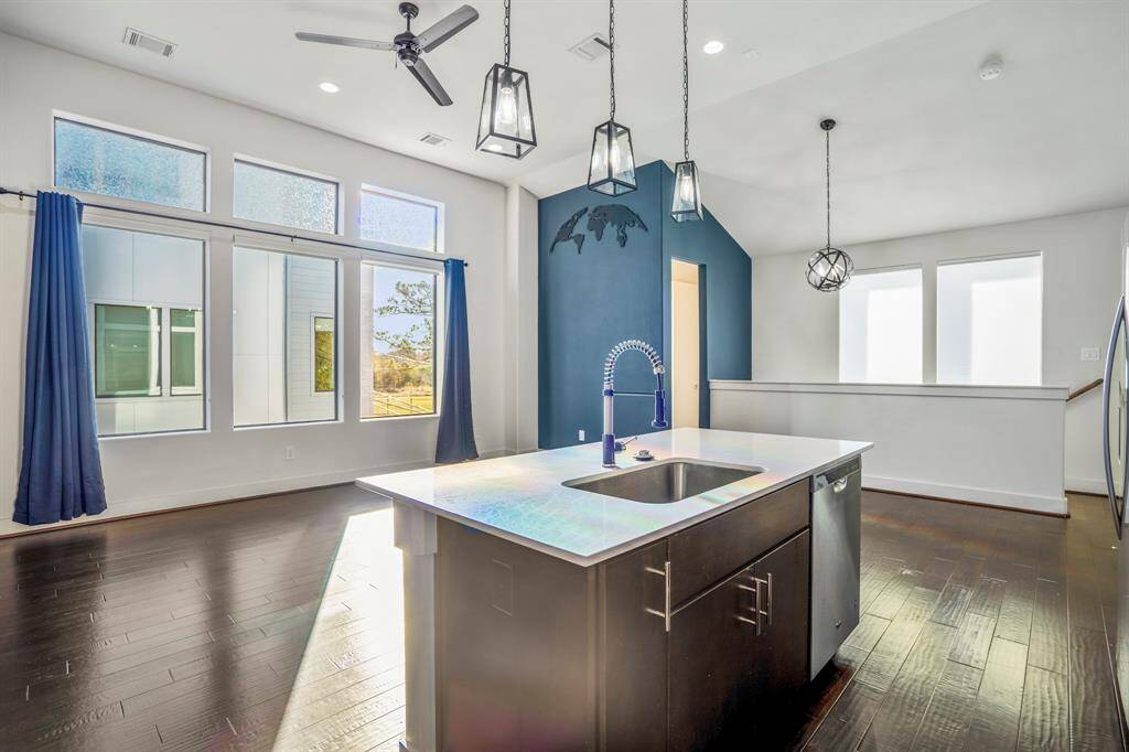 Large windows fill the living space with natural light.