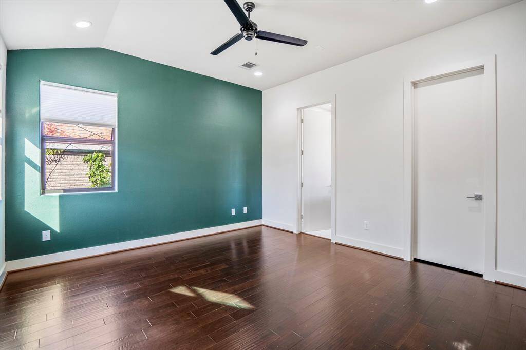 Spacious primary suite with room for king-size furniture.