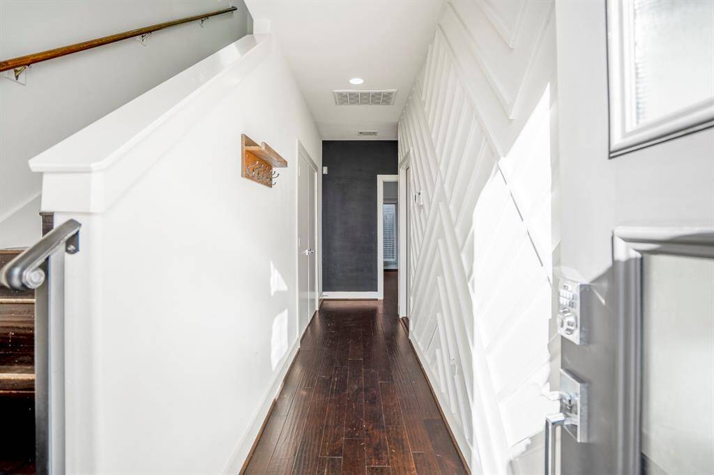 Bright and inviting entryway with modern finishes.