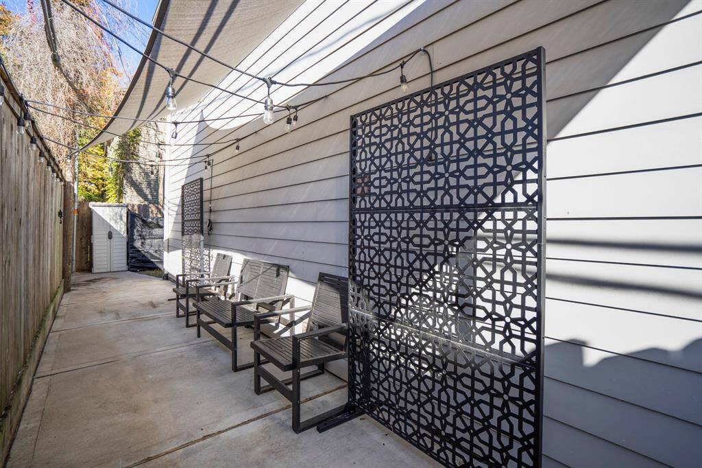 Upgraded private side yard—great for relaxing or morning coffee.