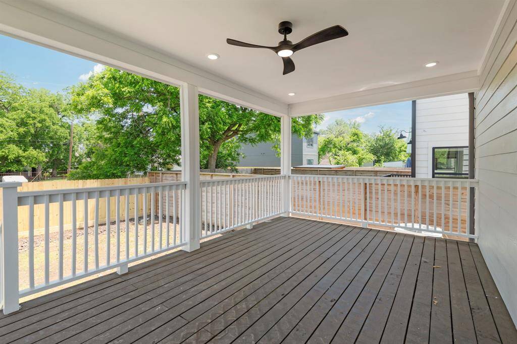 Step onto the sprawling covered back porch, ideal for enjoying the outdoors year-round.