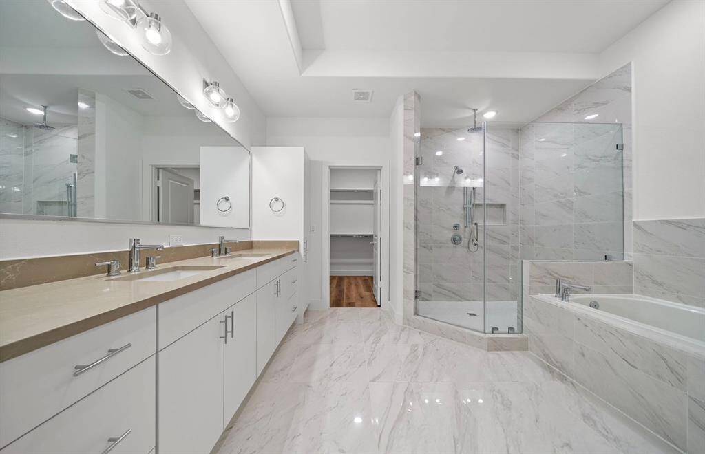 Here is a view of another one of our floor plans with a gorgeous shower and tub. Somerset Green homes have beautiful freestanding tubs in the Primary bathrooms.