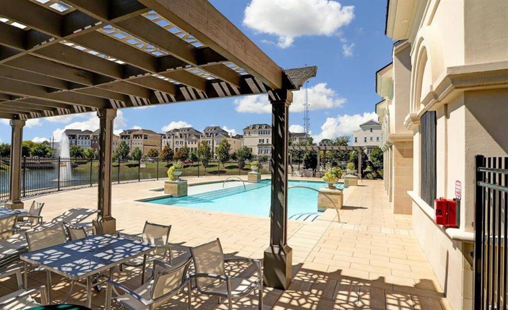 A view of the beautiful European style pool from one of the shaded sitting areas.