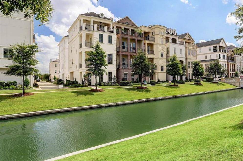 Canals and walkways flow through the community.