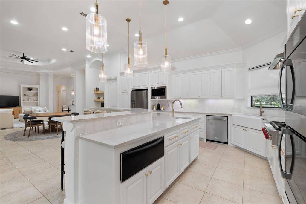 Stunning kitchen with quartz counters.