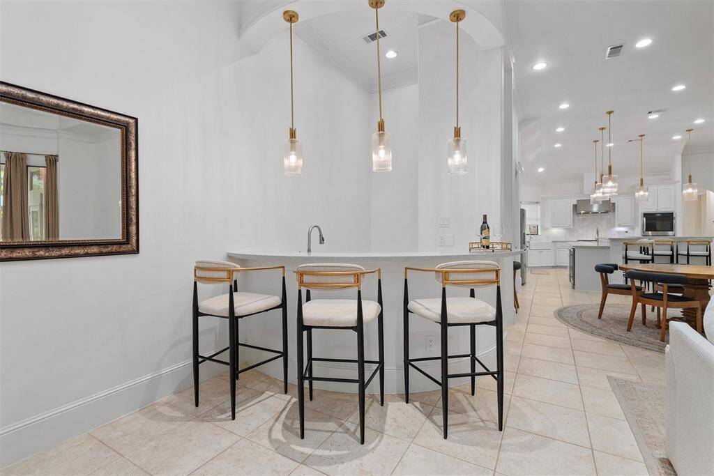 This home was built for entertaining. More bar seating.