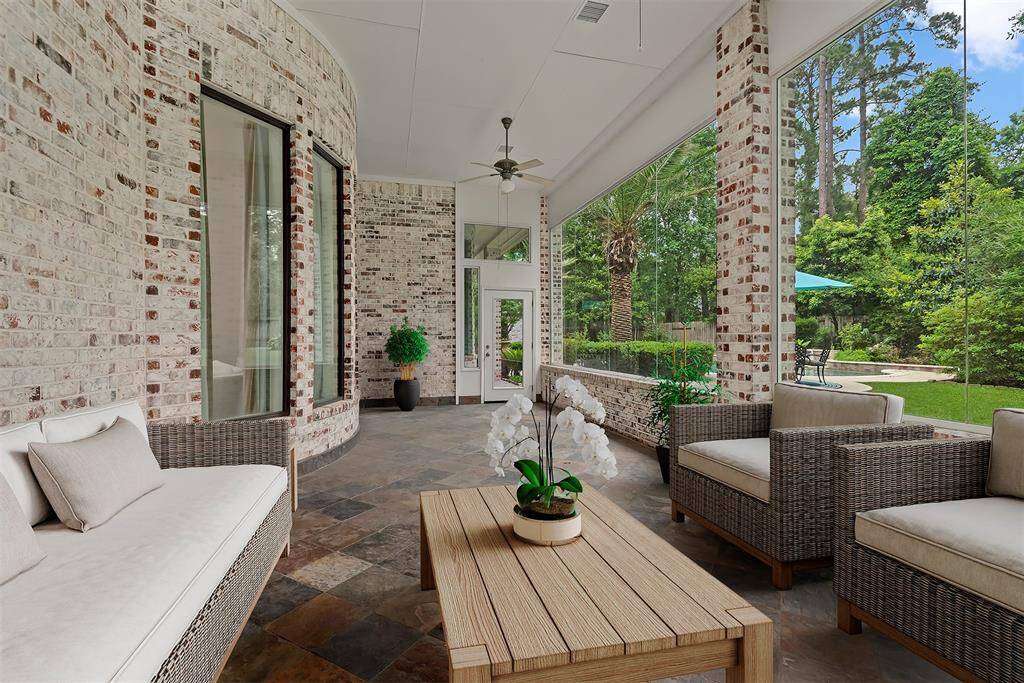 Glass enclosed, air conditioned sun-room.