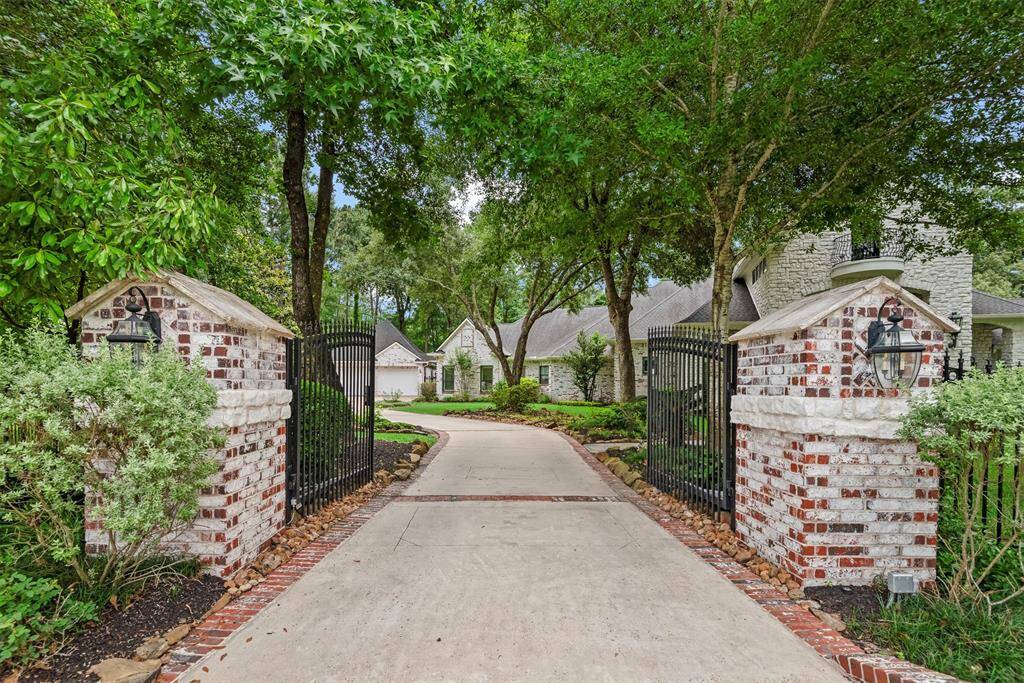 Grand gated, tree-lined entrance