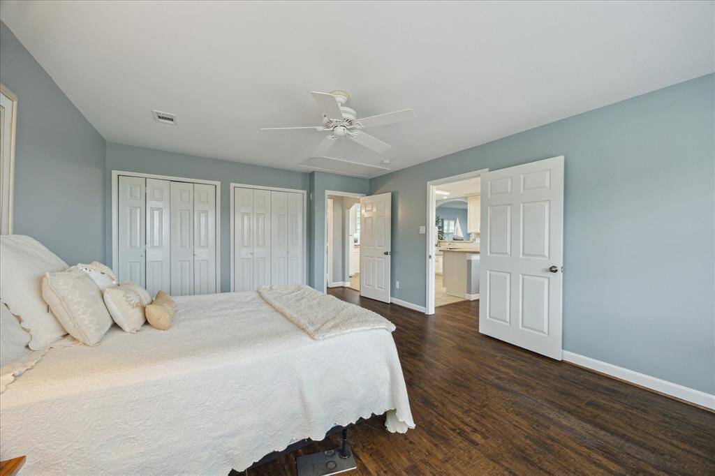The apartment bedroom has direct access to the bathroom and a large double door reach-in closet.