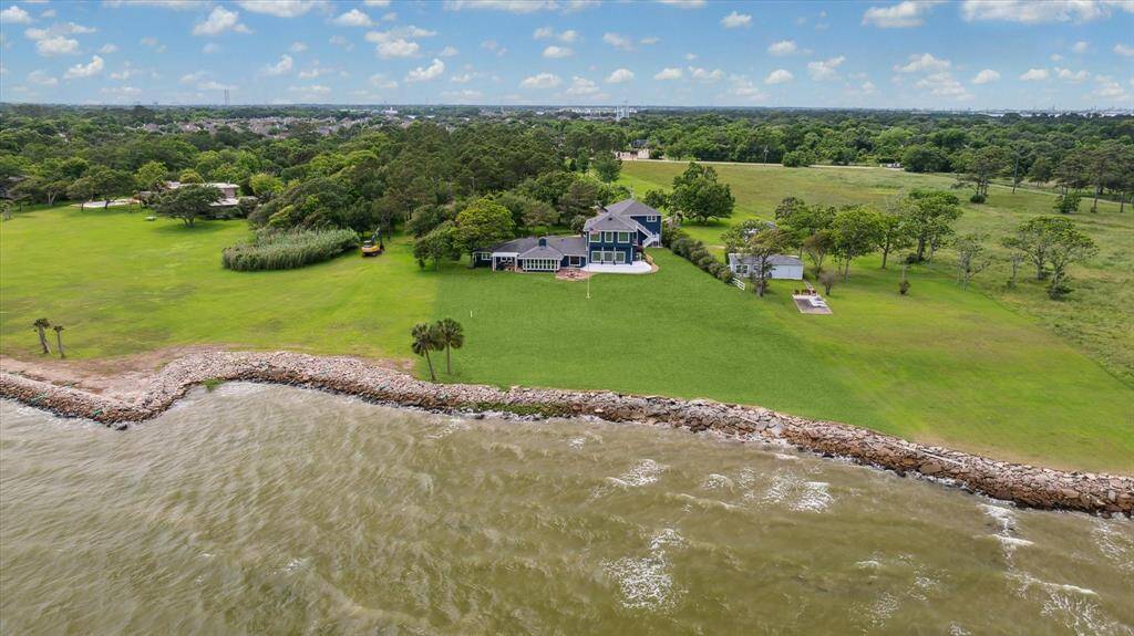 Aerial view form the water looking over the property.