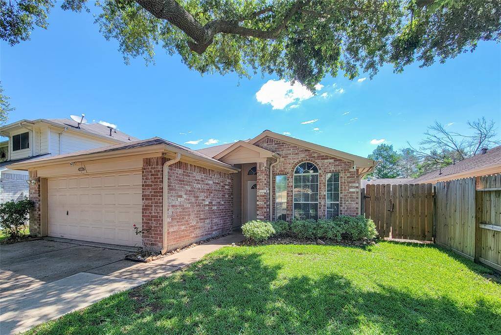 Discover the inviting entrance of 4226 Daisy Meadows Dr., where charm and warmth greet you.