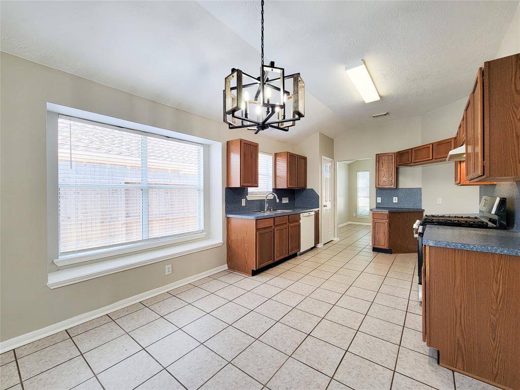 Upgraded light fixture adds a touch of style to your meal time.