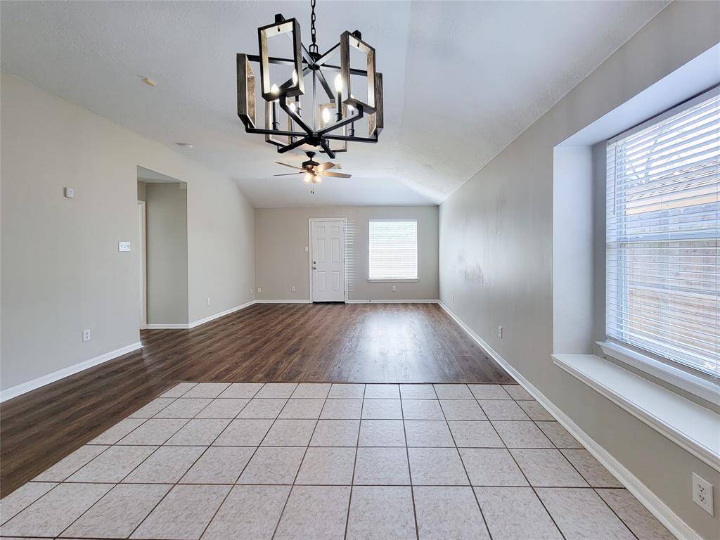 Breakfast area seamlessly connects to the den.