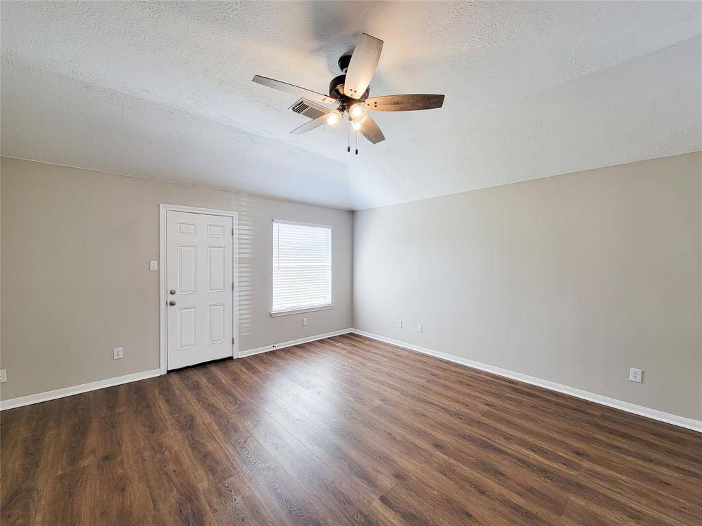 Bright, clean, and inviting, this home features high ceilings and fresh paint throughout.