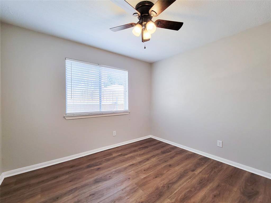 Bright and immaculate third bedroom.