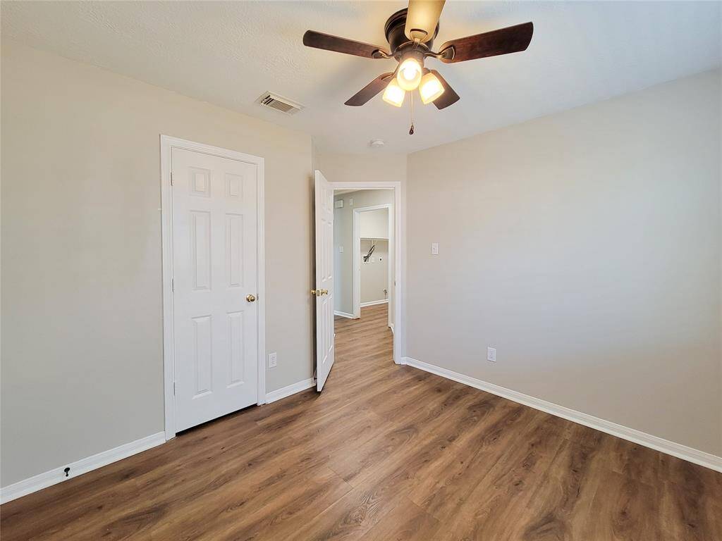 This room features a newly upgraded ceiling fan with integrated lighting.