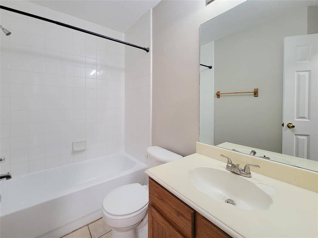 Inviting hall bath featuring a convenient tub/shower combo.