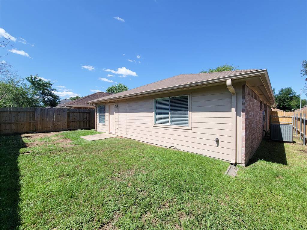 Enjoy a serene, fenced backyard perfect for relaxation and privacy.