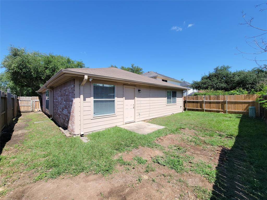 Charming home with three sides brick and a durable Hardiplank rear.