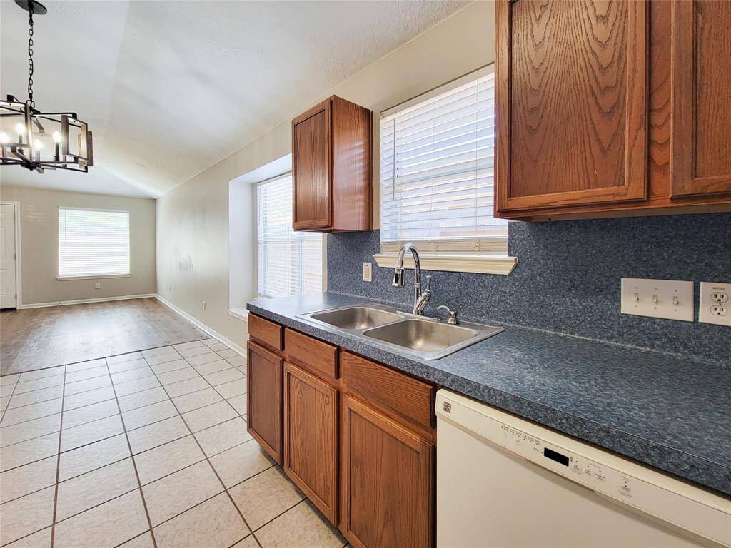Sleek double stainless steel sink for modern convenience.