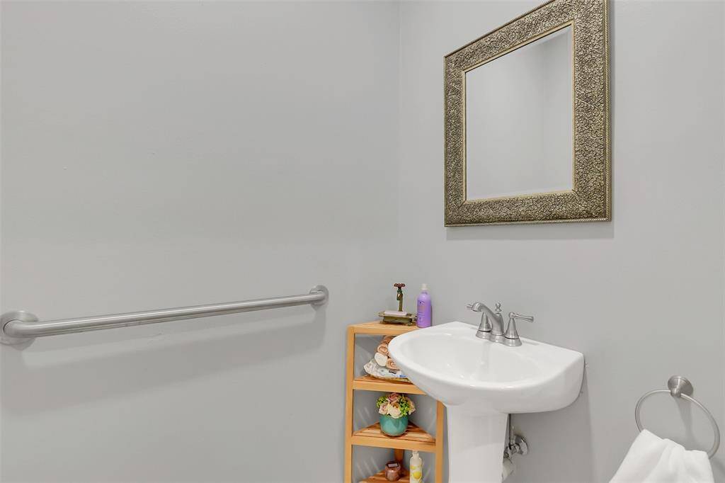 Half bathroom off the kitchen.