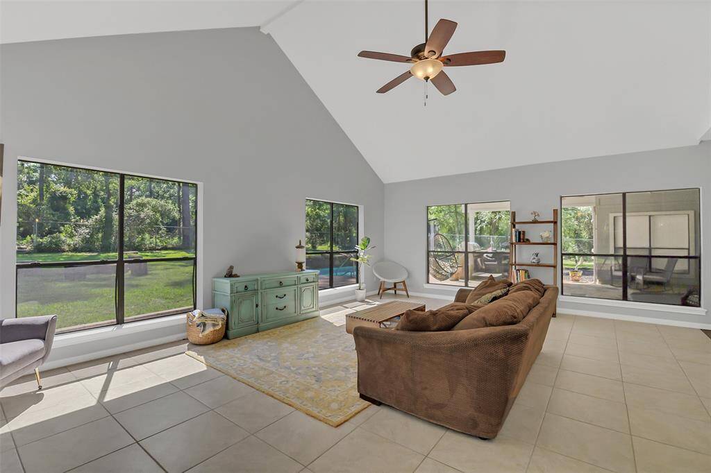 Another view of the living room and covered back patio.