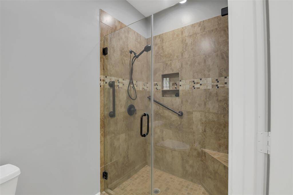 Primary bathroom with oversized shower.