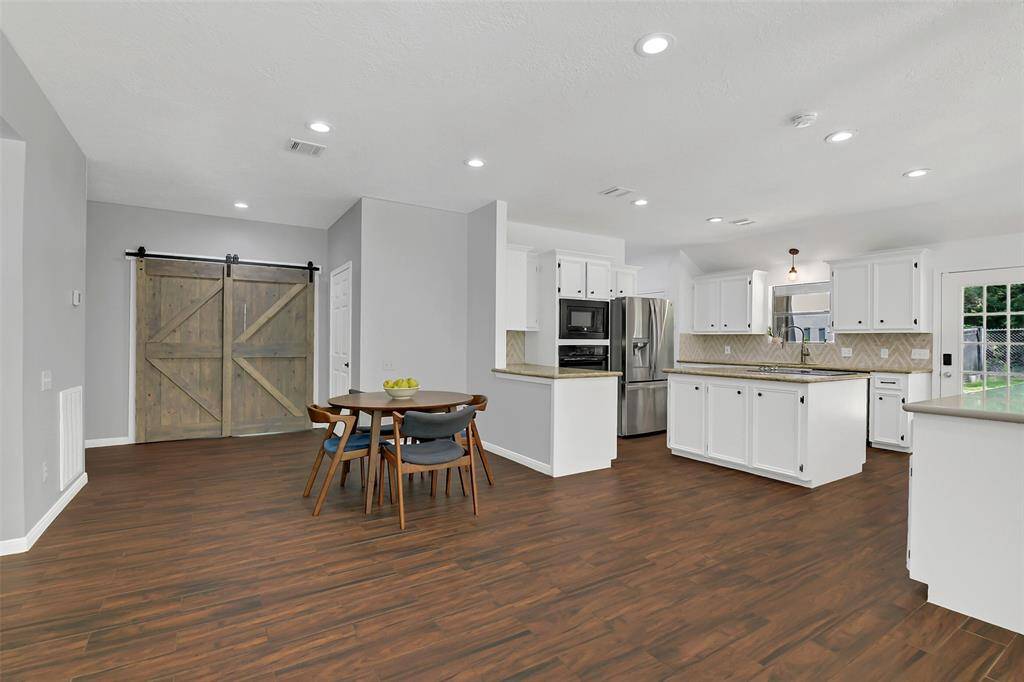 Another view of the kitchen from the nook/dining area.