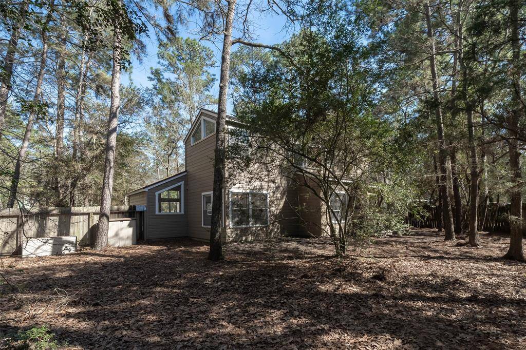 Low maintenance yard! Very private and woodsy