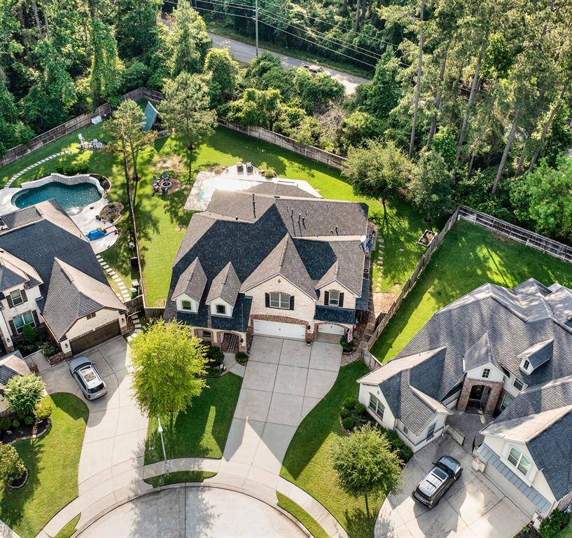 Oversized pie-shaped lot at the end of a cul-de-sac, backing to trees!