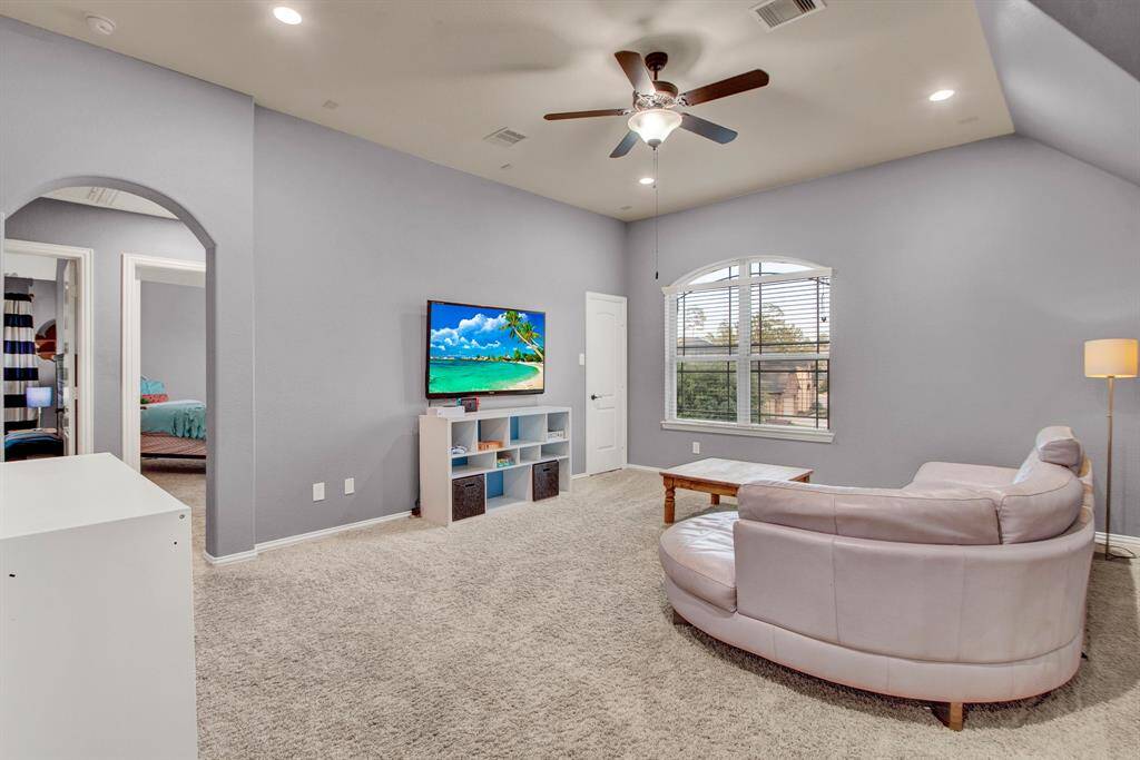 HUGE second floor game room is another perfect hang-out space.