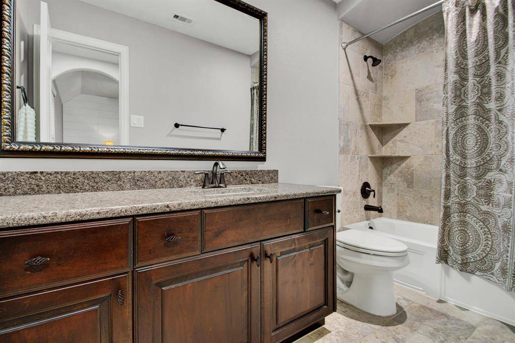 Private ensuite bath located off the 4th secondary bedroom.