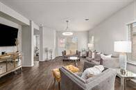 Digitally staged Family room/bkfst area
