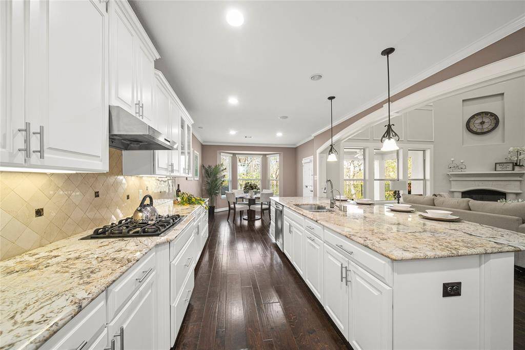 Comtemporary Chef's Dream Kitchen features all stainless steel appliances, level 5 granite countertop.
