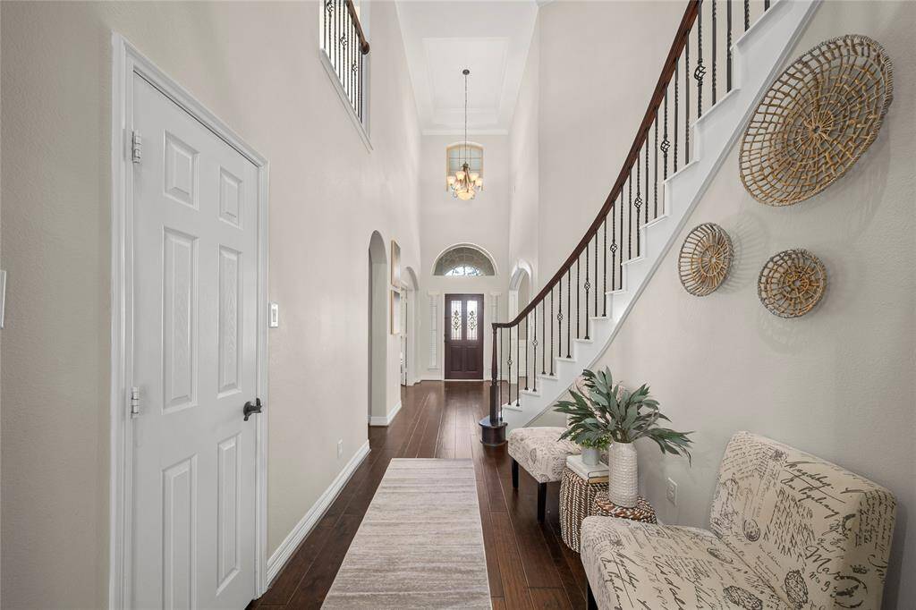 Grand entrance with high ceiling.