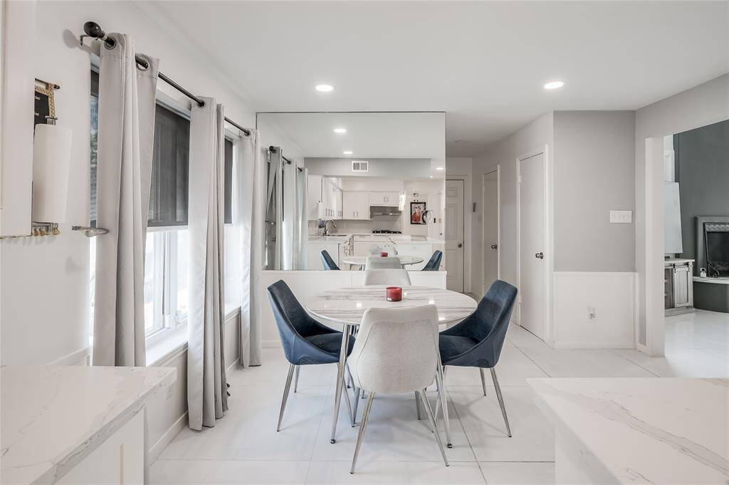 Enjoy the convenience and charm of this delightful breakfast area, designed as the perfect spot for your morning routine. With its inviting ambiance and practical layout, this space offers a cozy setting for enjoying your first meal of the day.