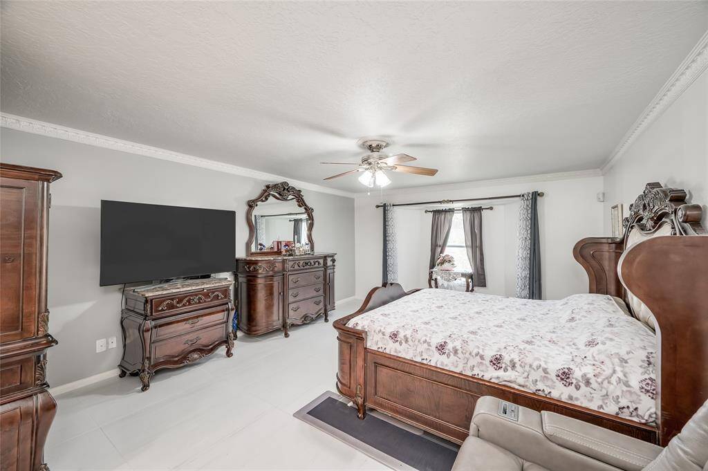 Discover your personal sanctuary in the luxurious primary bedroom, designed for ultimate relaxation and comfort. The room features a generous layout, perfect for accommodating a large bed and additional furniture. This primary bedroom offers a perfect blend of sophistication and comfort, making it a true highlight of the home.