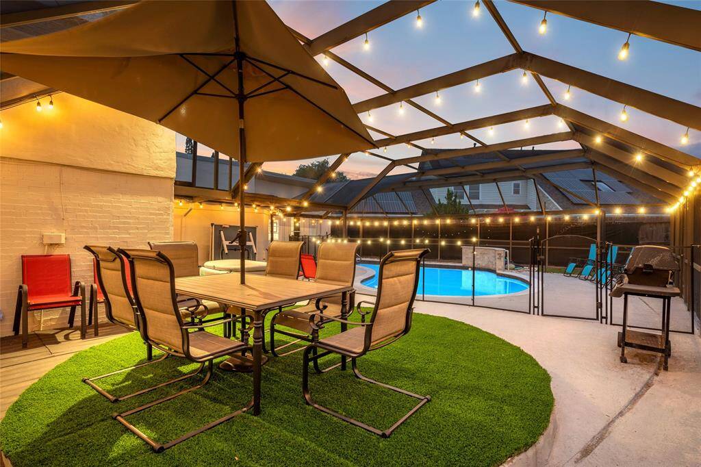 Welcome to your backyard oasis, where a beautiful pool is complemented by a chic seating and dining area. It's the ideal spot for outdoor BBQs, entertaining, and enjoying quality time with family and friends.