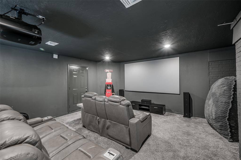 This impressive media room is designed to provide an immersive and comfortable viewing experience. Featuring ample space for a large screen or projector, high-quality sound system, and plush seating, this room is perfect for movie nights, gaming, or watching your favorite shows.