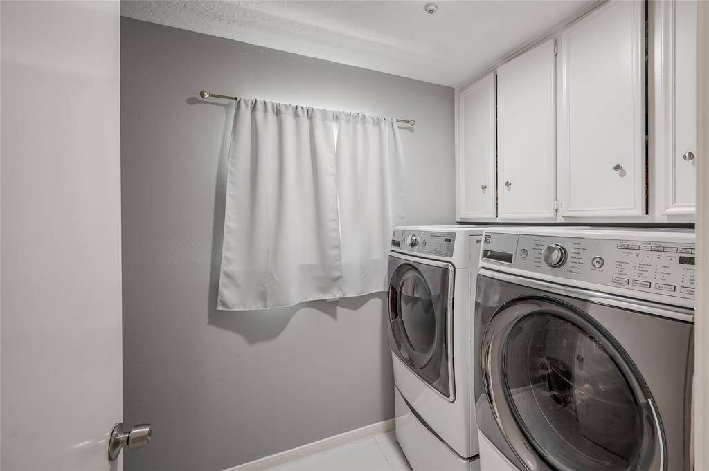 Enjoy the convenience and practicality of this thoughtfully designed indoor laundry room, ideally situated within the home for effortless access.Having the laundry room inside the house ensures you can manage chores without braving the elements, adding to your everyday comfort and ease.