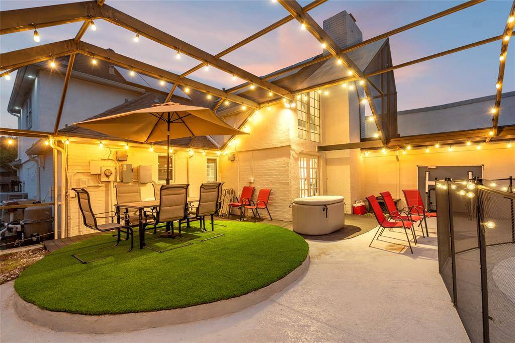 A stylish seating and dining area. This inviting space is thoughtfully designed with a mesh roof and side walling, providing a perfect balance of shade, ventilation, and protection from the elements. Ideal for outdoor dining and relaxation, this area offers a comfortable and breezy atmosphere, making it a versatile spot for both casual gatherings and quiet retreats.