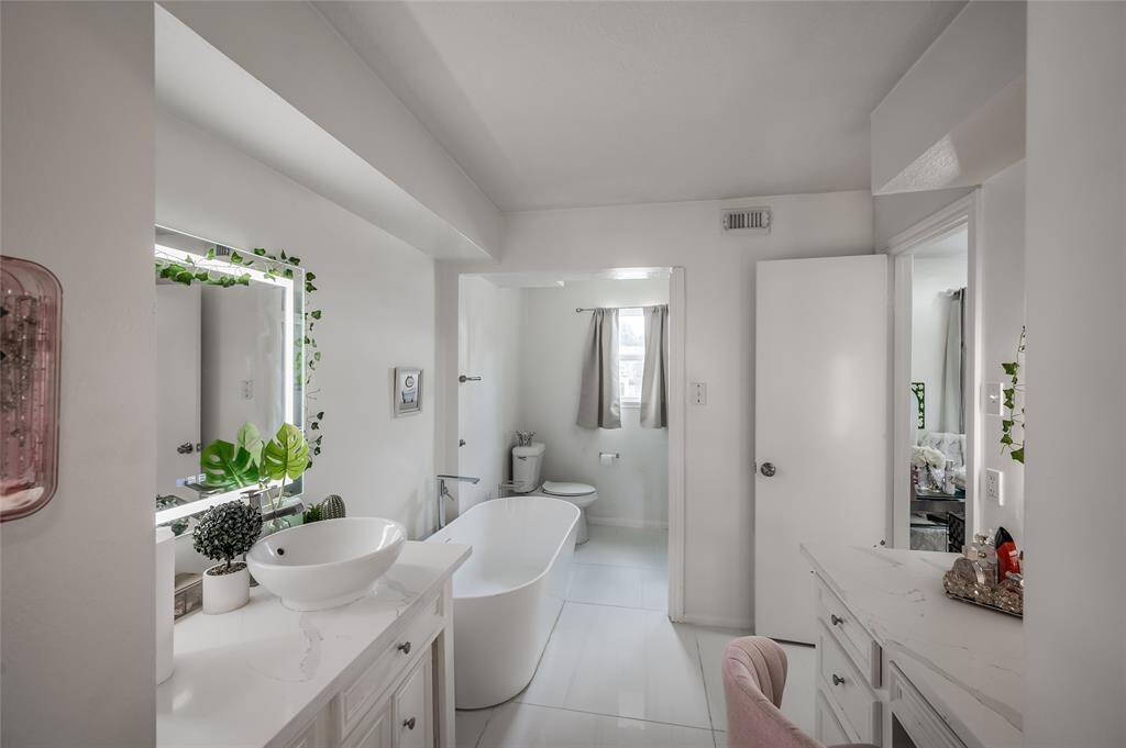 Conveniently located on the second floor, this well-appointed bathroom offers both functionality and comfort. Featuring a separate vanity area, it provides ample space for personal care and grooming, while the adjoining tub offers a relaxing retreat for unwinding after a long day. The thoughtful layout ensures that the bathroom is both practical and stylish, making it a valuable addition to the home’s upper level.